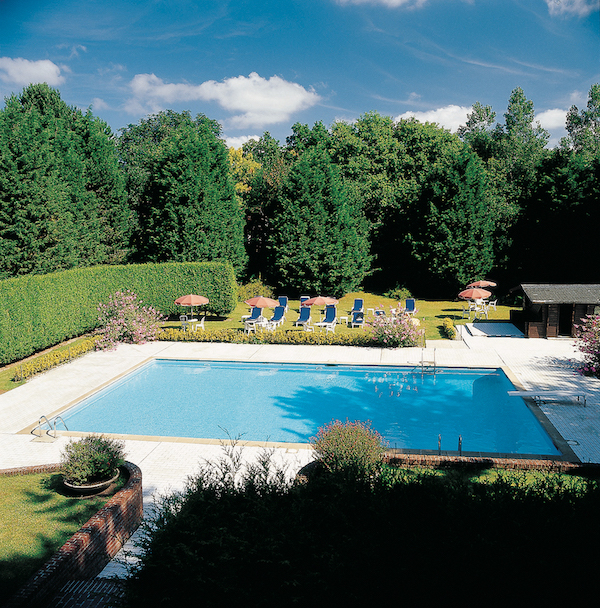 The outdoor swimming pool at Le Manoir Golf Hotel, Le Touquet, France
