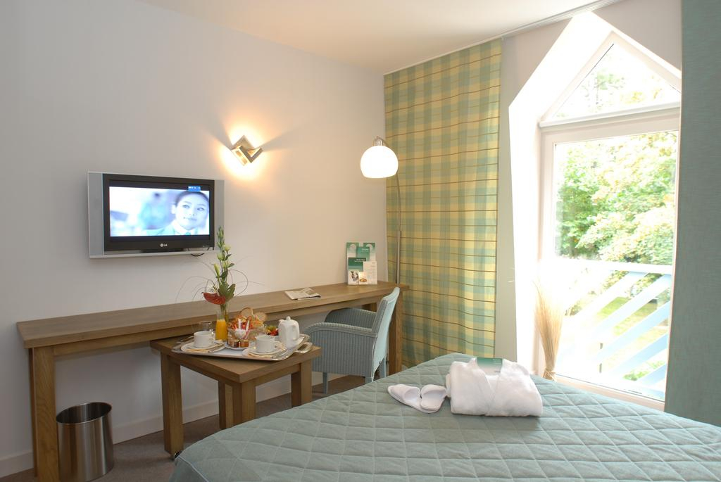 Sunny bedroom at Holiday Inn, Le Touquet, Northern France
