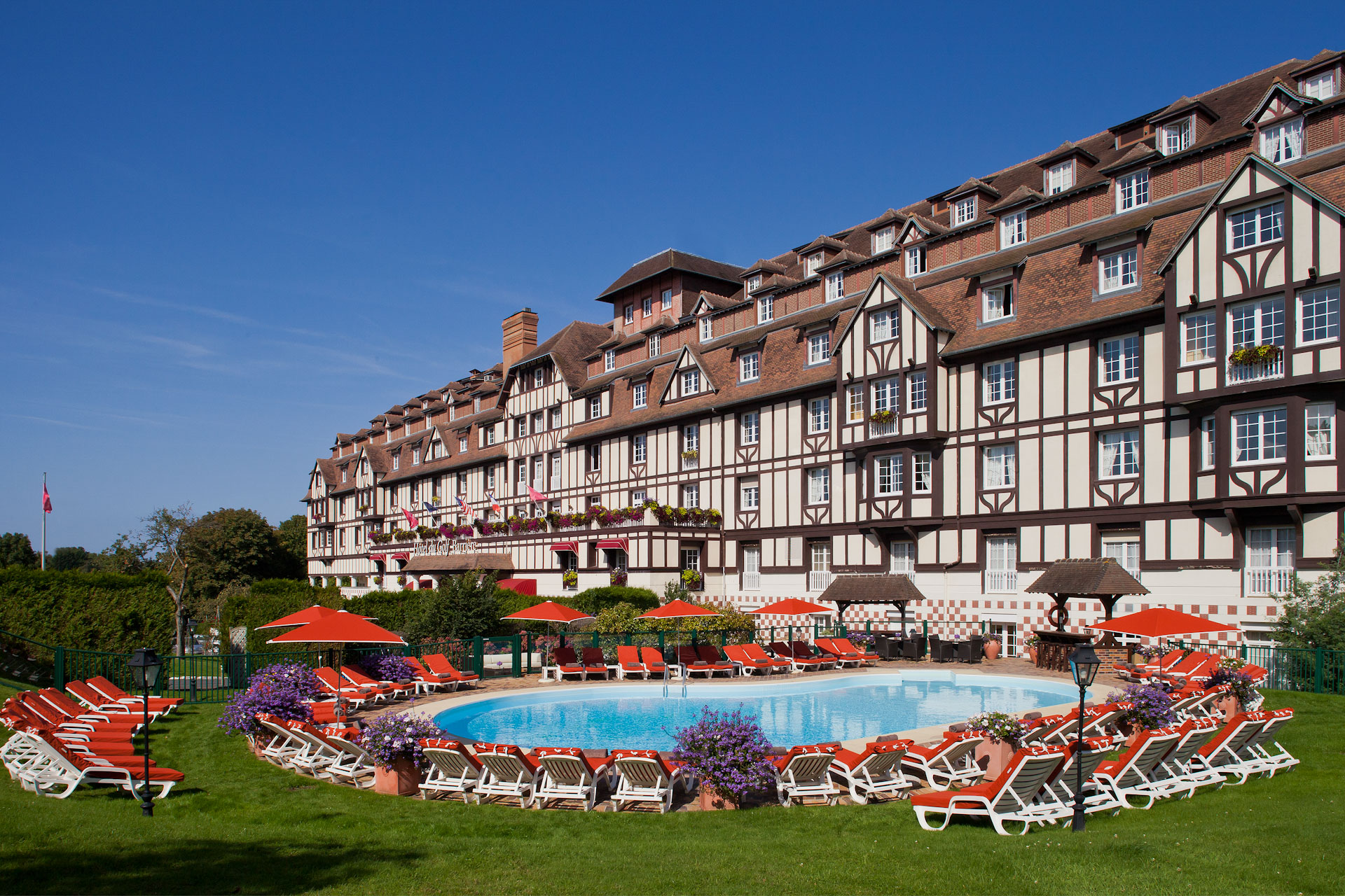 The heated outdoor pool at Hotel du Golf Barriere, Deauville, Normandy, France. Golf Planet Holidays