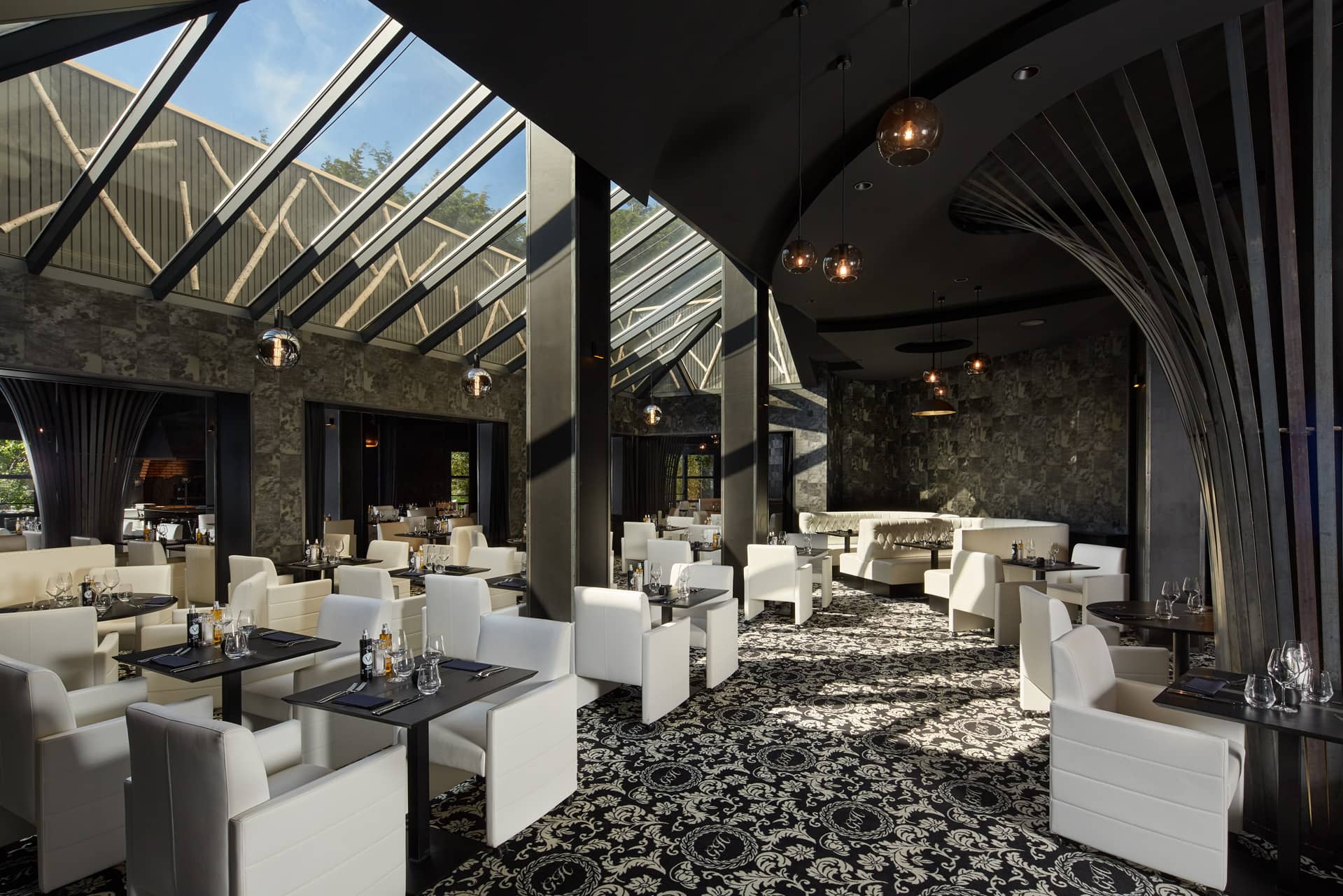 Enjoy dinner in the atrium at Le Grand Hotel, Le Touquet, Northern France