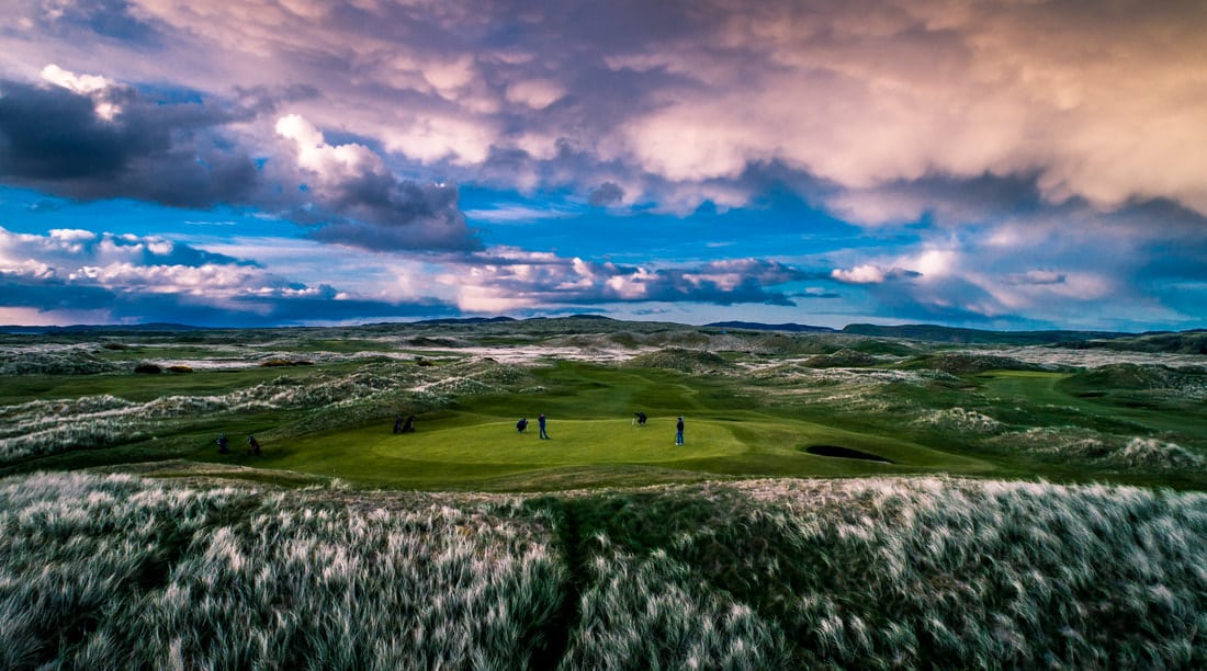 Dramatic skies above the eighth green at Ballyliffin Golf Club, Northern Ireland