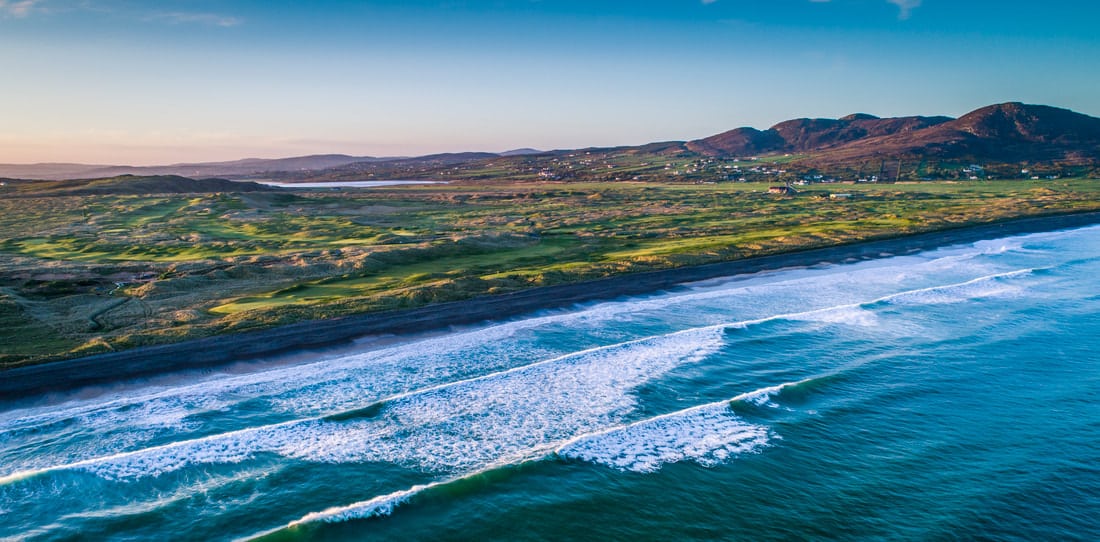 Aerial view from the sea over Ballyliffin Golf Club, Northern Ireland
