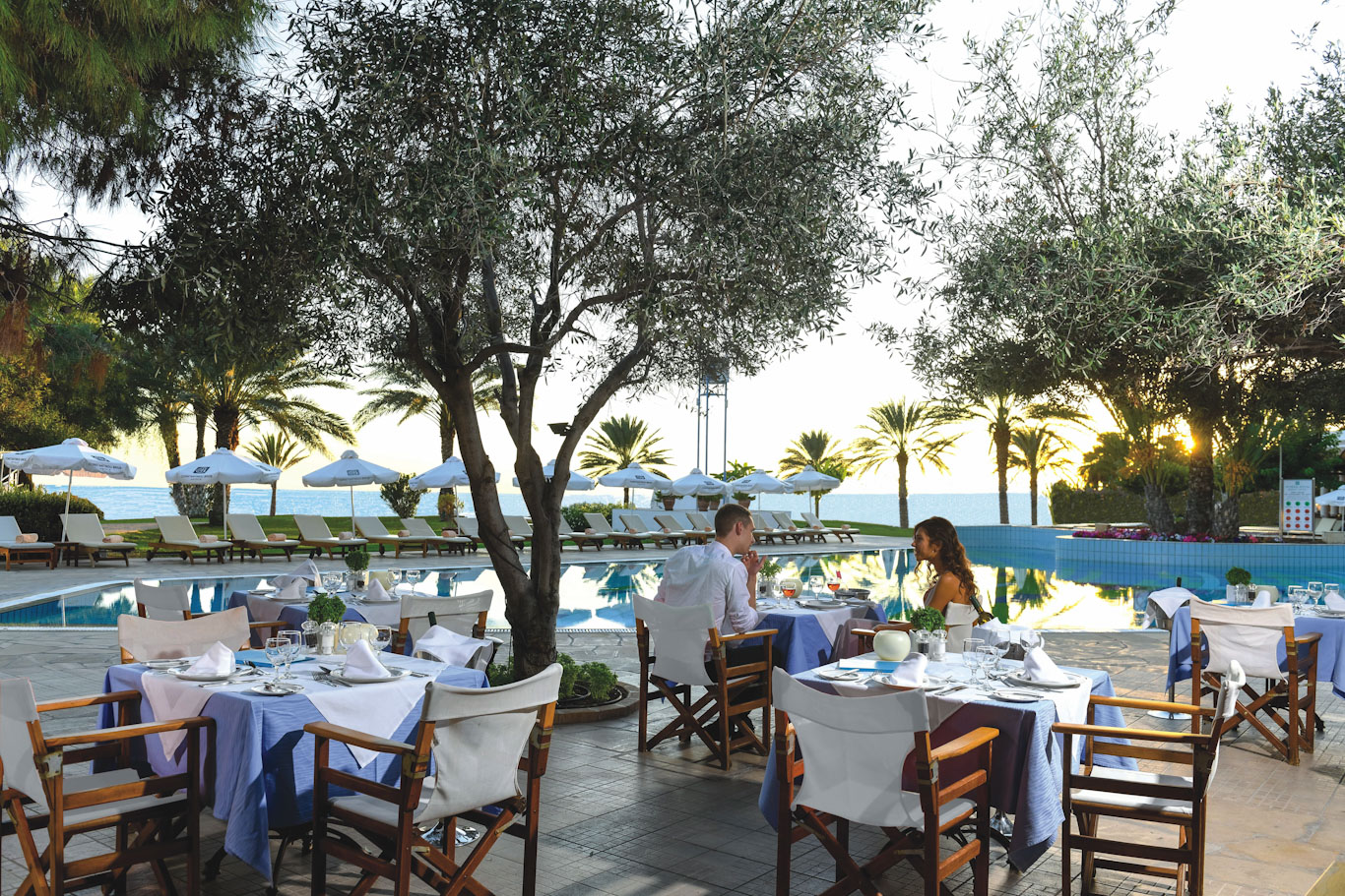 Dine on the outside terrace at Constantinou Bros Athena Royal Beach hotel Paphos, Cyprus