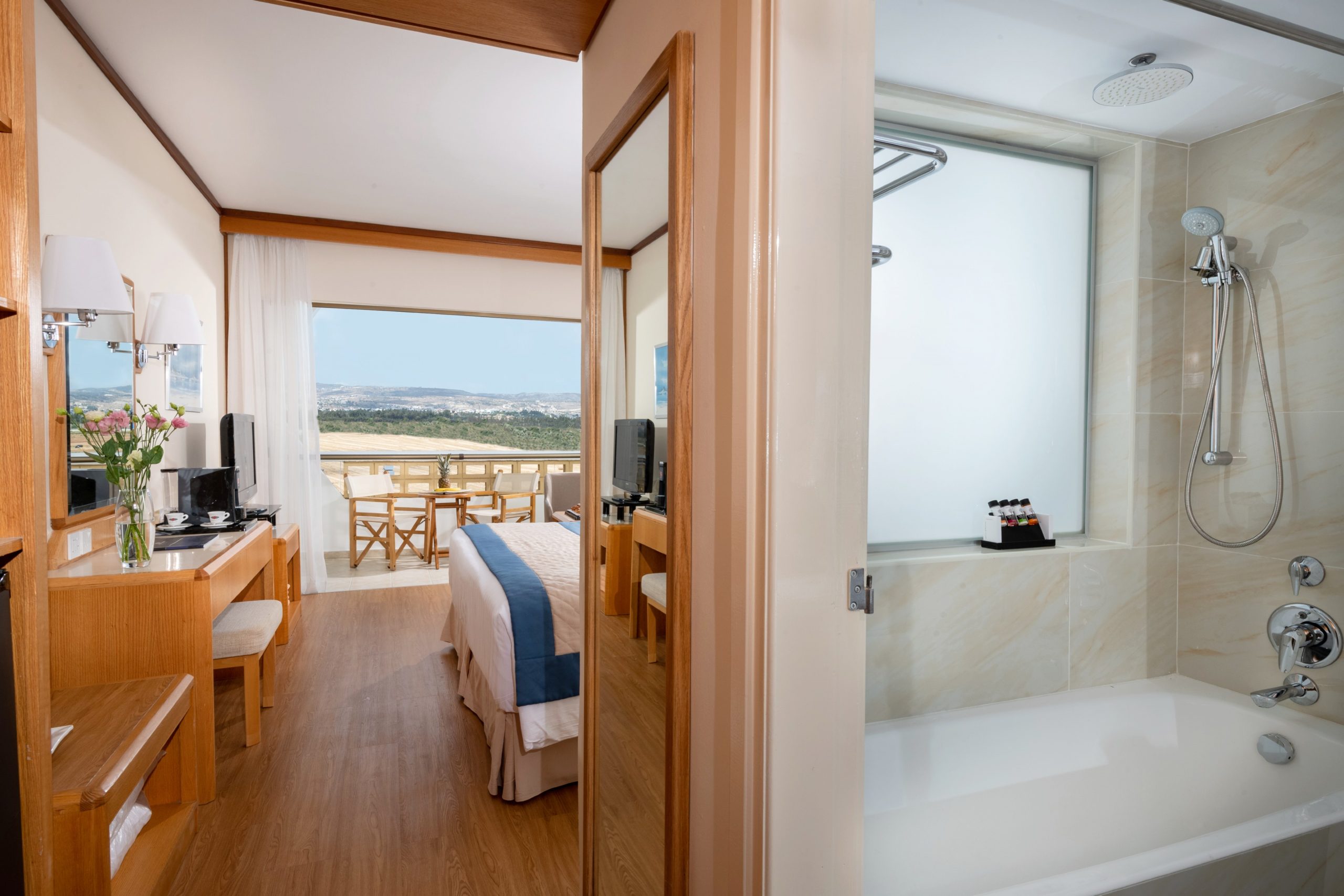 Bedroom overlooking the hills at Constantinou Bros Athena Royal Beach hotel Paphos, Cyprus
