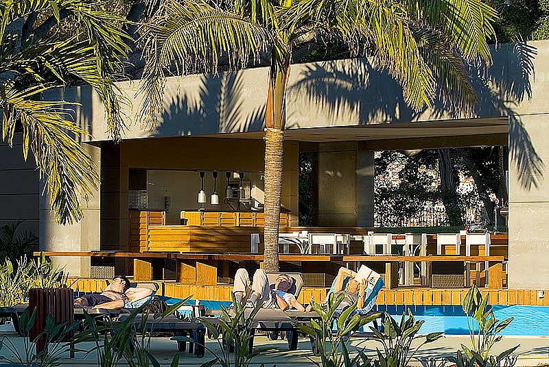 Relax by the pool after golf at Pestana Casino Park hotel Madeira