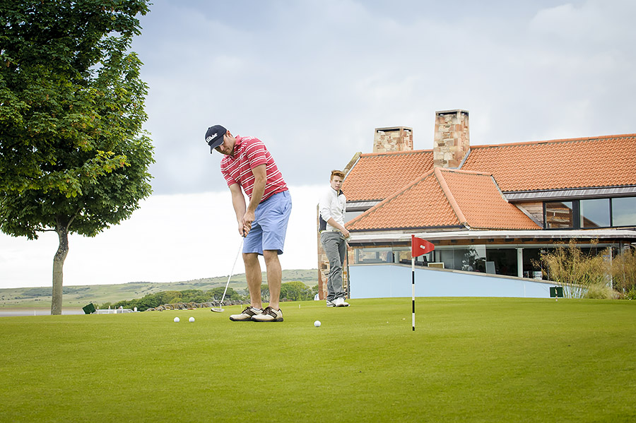 Practising putting at Craigielaw Golf Club, East Lothian, Scotland