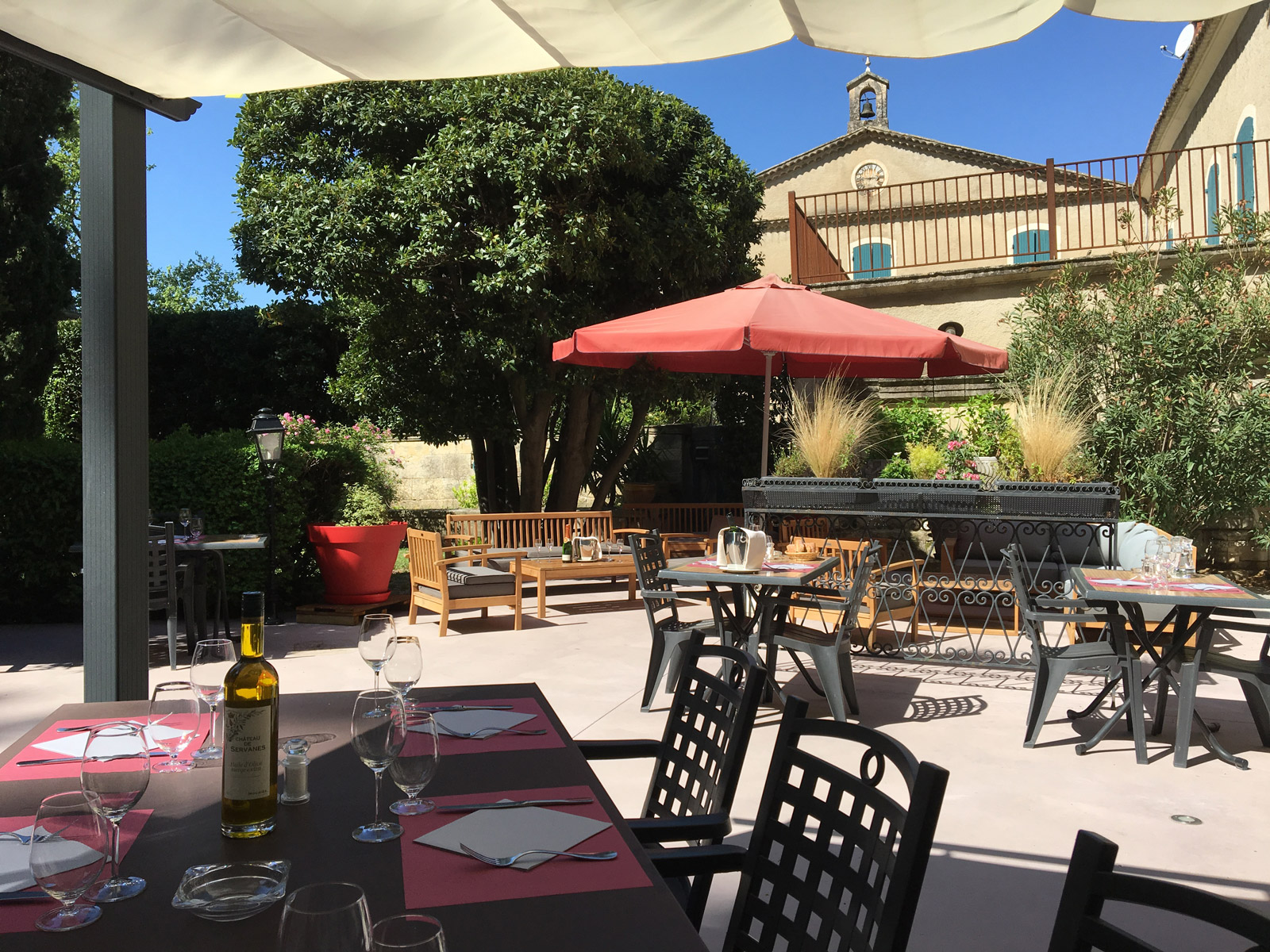 Outdoor dining at Chateau de Servanes, Les Baux de Provence, France. Golf Planet Holidays