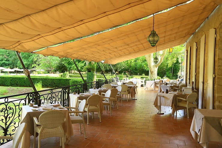 On the terrrace at Moulin de Vernegues, Mallemort, Provence. Golf Planet Holidays.