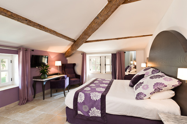 Timber ceiling in a bedroom at Moulin de Vernegues, Mallemort, France
