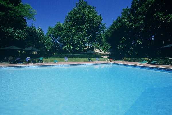 The large outdoor swimming pool at Moulin de Vernegues, Mallemort, France