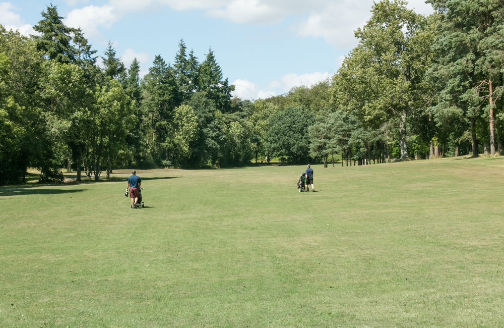 Walking the fairway at Bramshaw Golf Club, Hampshire, England
