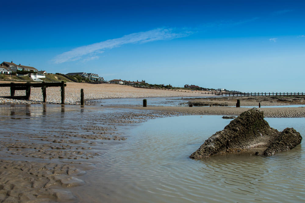 The pebble beach outside The Cooden Beach Hotel, Bexhill-on-Sea, England