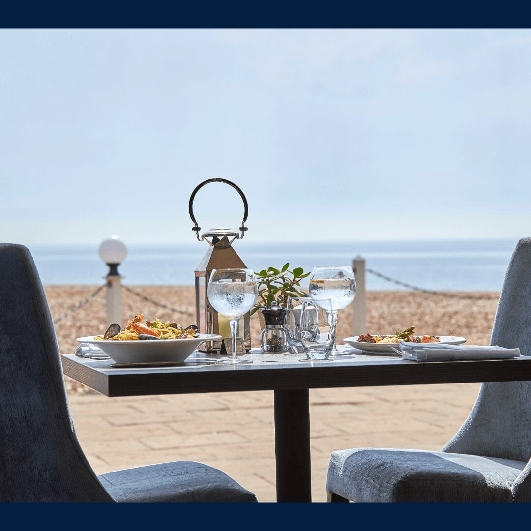 Dine on the terrace at The Cooden Beach Hotel, Bexhill-on-Sea, England