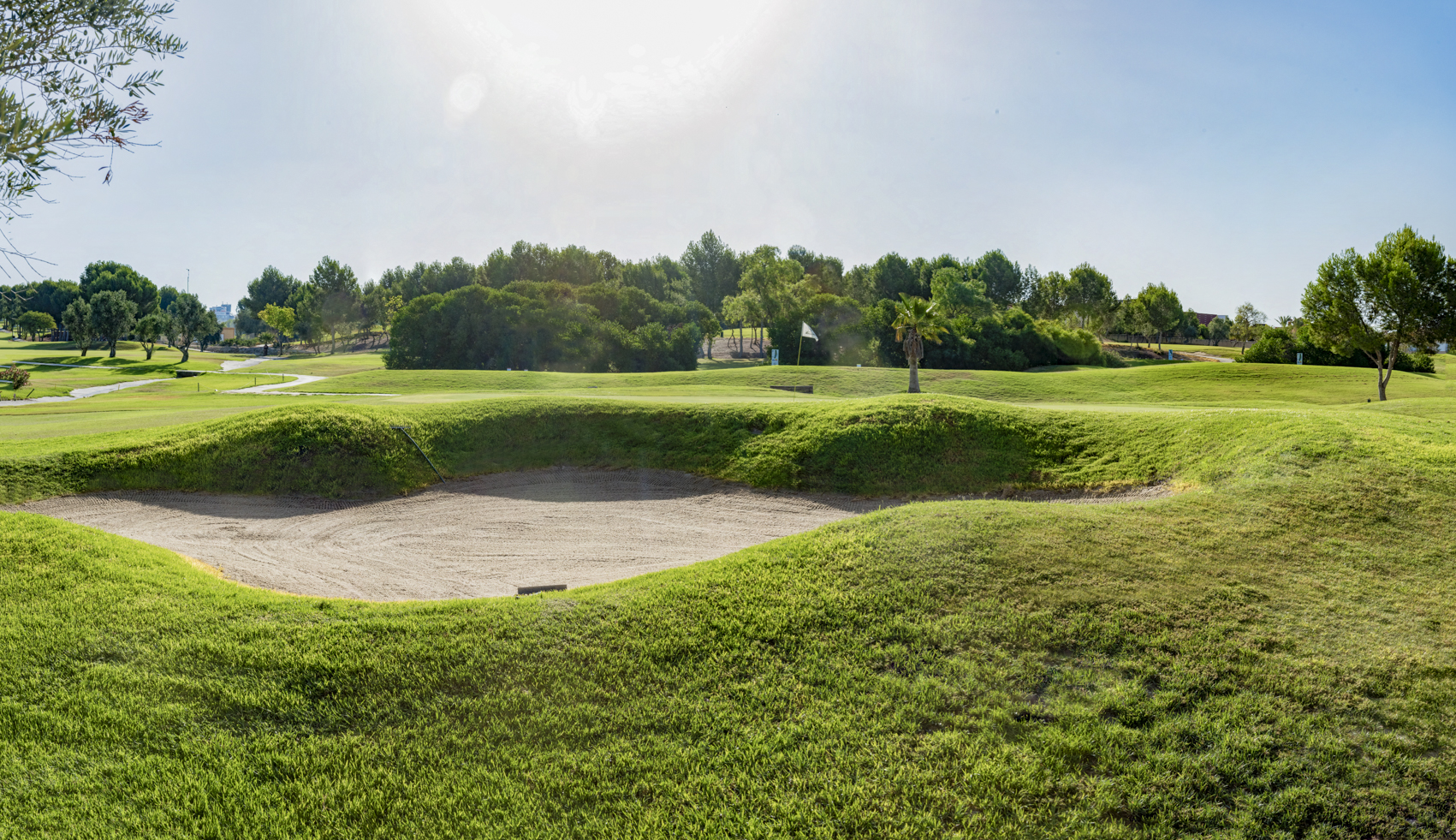A gentle chip onto the green needed at Altorreal Golf, Murcia, Spain.