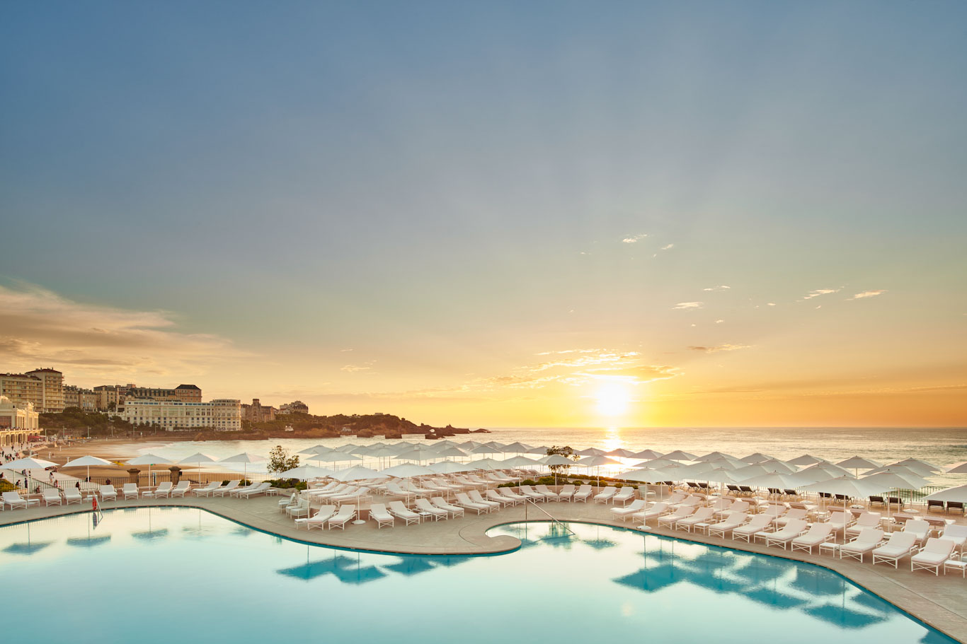 The outdoor swimming pool and terrace at the Hotel du Palais Biarritz, France