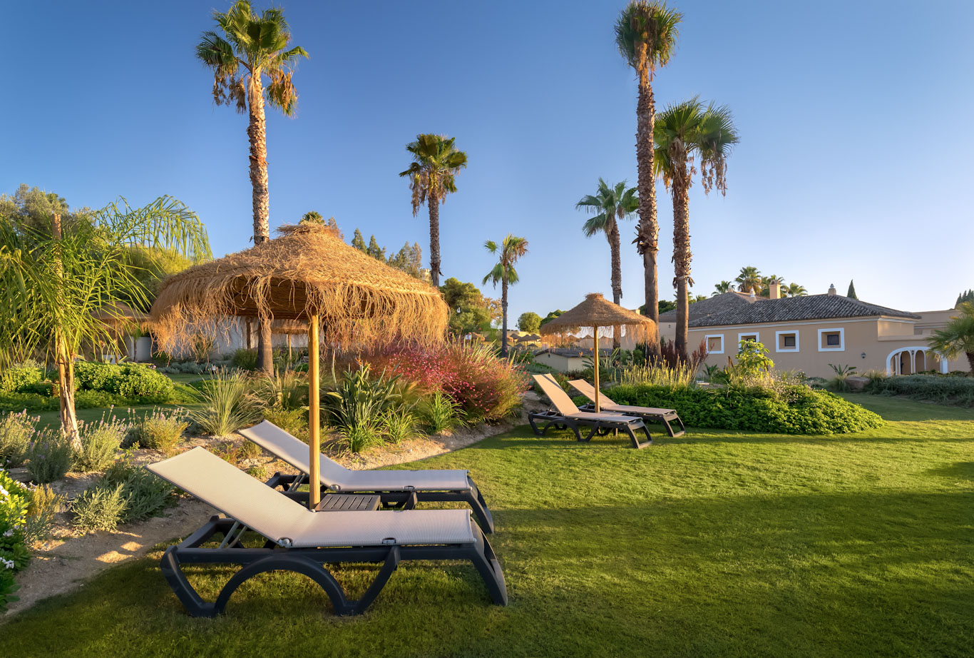 Relax on the sunloungers after golf at Montecastillo Resort Hotel, Jerez, Spain