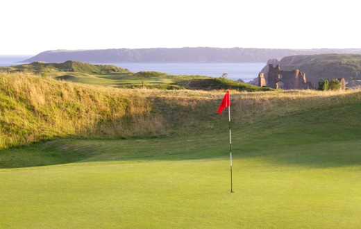 On the green at Pennard golf club Golf Course, Swansea, Wales. Golf Planet Holidays.