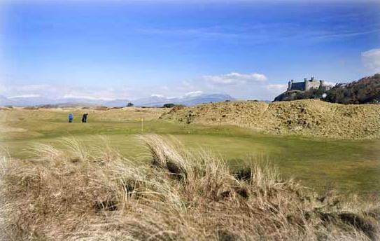Approaching the flag at Royal St Davids Golf Course, Wales. Golf Planet Holidays