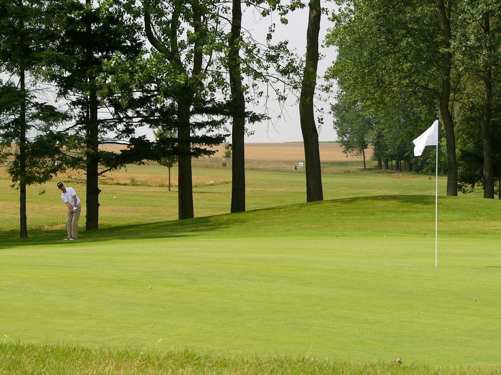 Playing up to the green at Pierpont Golf Club, near Waterloo, Bruges
