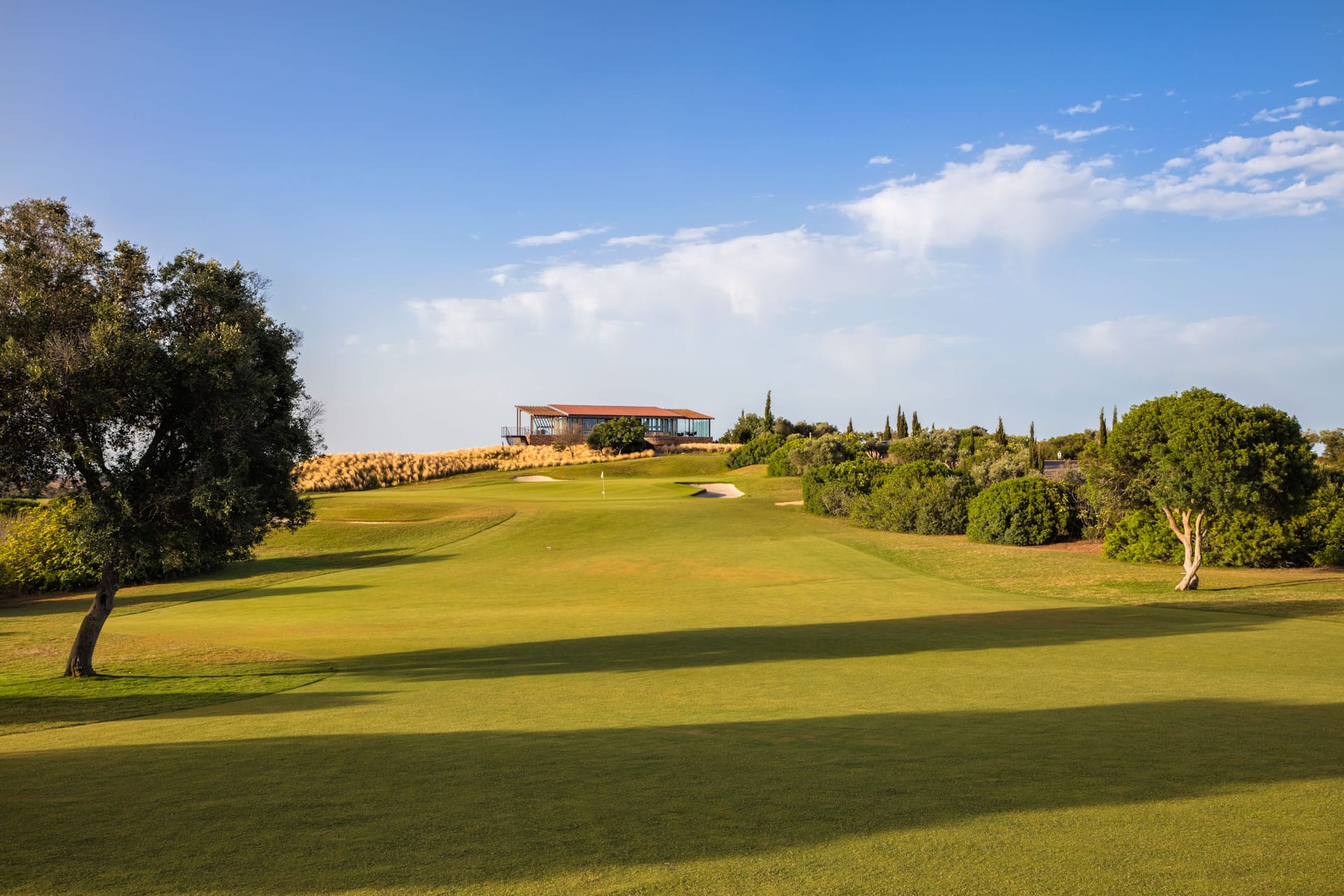 Clubhouse in sight at Espiche Golf Club, Lagos, Portugal. Golf Planet Holidays
