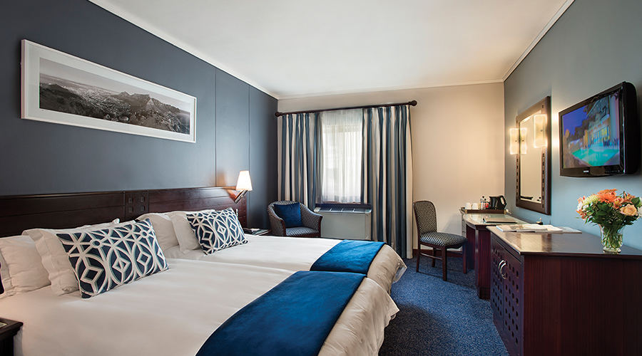 Double bedroom at The Commodore Hotel, Cape Town South Africa. Golf Planet Holidays.