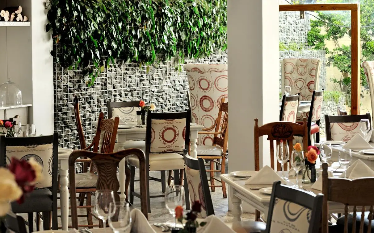 Dining at the Oude Werf Hotel, Stellenbosch, South Africa. . Golf Planet Holidays.