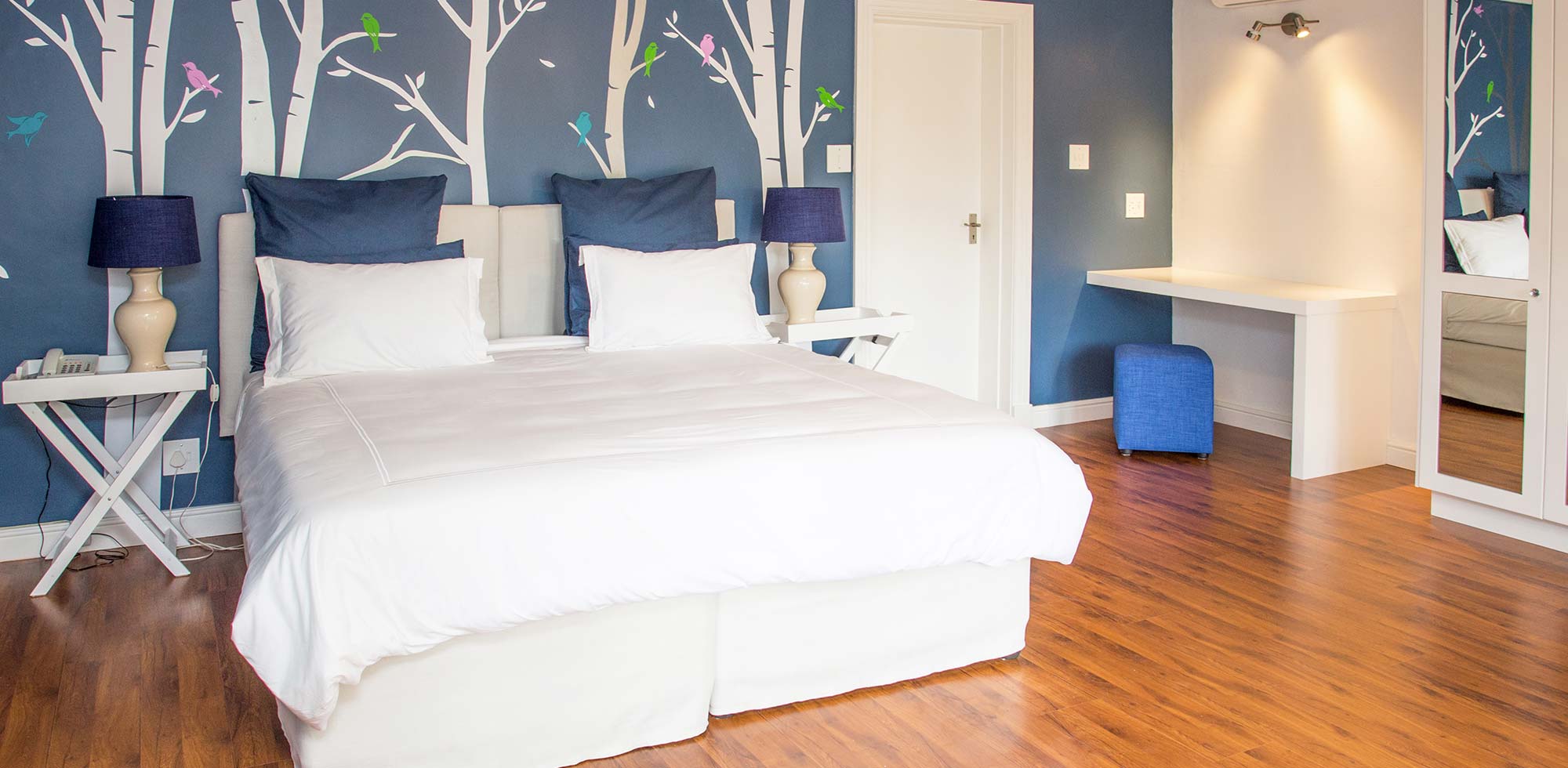 A superior room in blue at Willowbrook Country House, Somerset West, South Africa